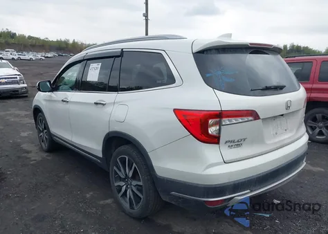 2021 Honda Pilot Awd Touring 7 Passenger z USA, uszkodzony, nr VIN 5FNYF6H68MB024972